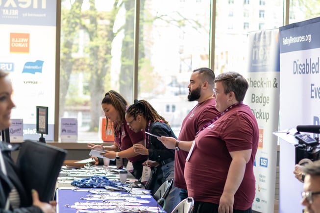 Relay Resources employees check in attendees