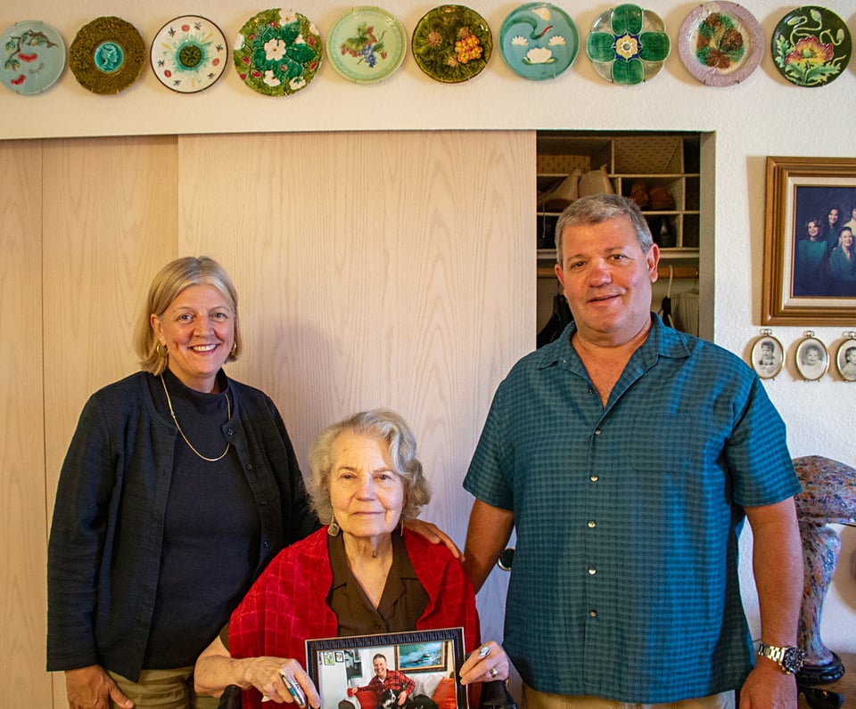 Pictured are Joe's mother Joyce Tebo (center), his brother Jay Tebo (right), and Jay's partner Jacque.