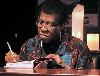 Octavia E. Butler signing a book